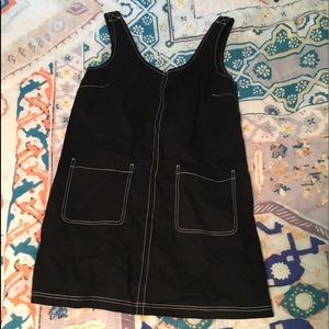 Black overall dress with pockets
